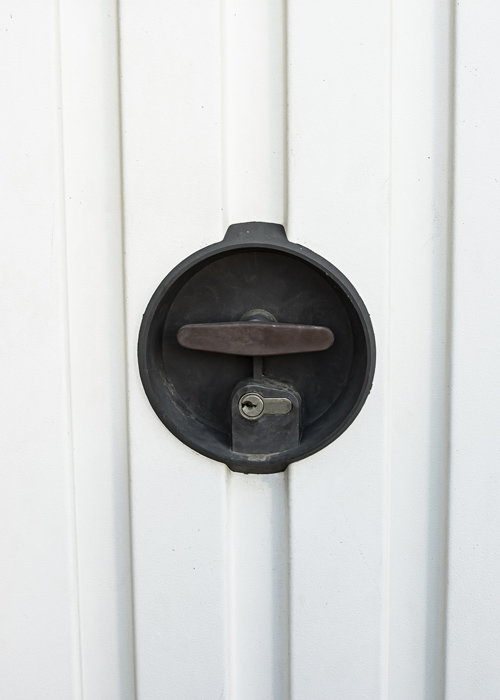 garage door repair company in Suffolk and Bishop's Stortford garage door twist lock in black on white door